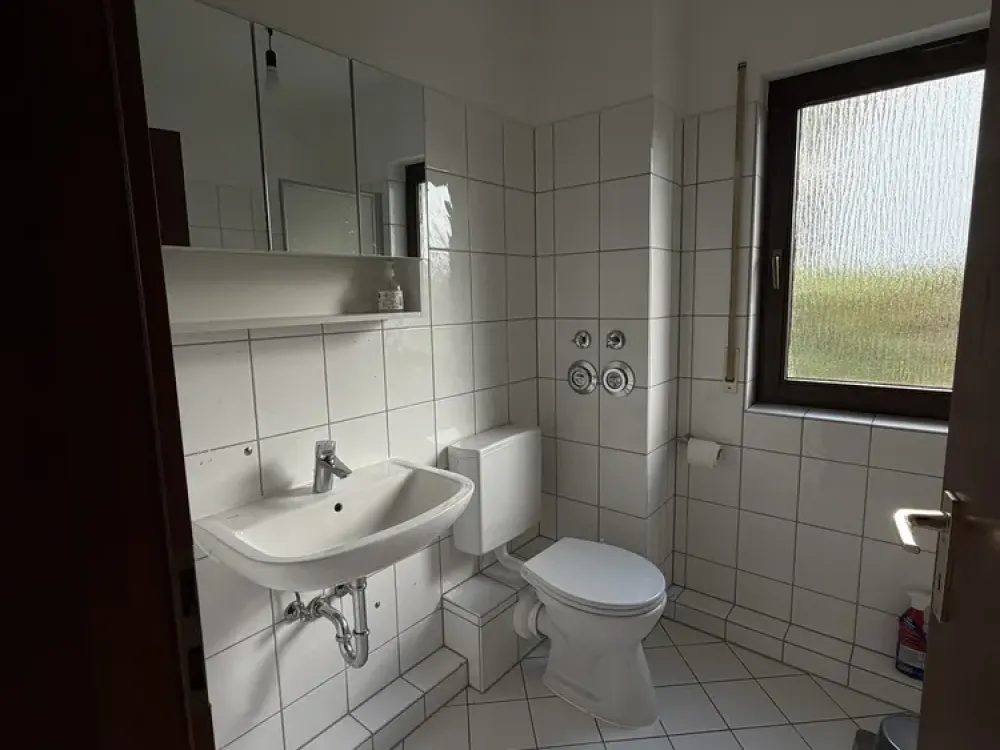 Charmante 2-Zimmer-Wohnung mit großem Balkon & Fußbodenheizung im gepflegten Mehrfamilienhaus