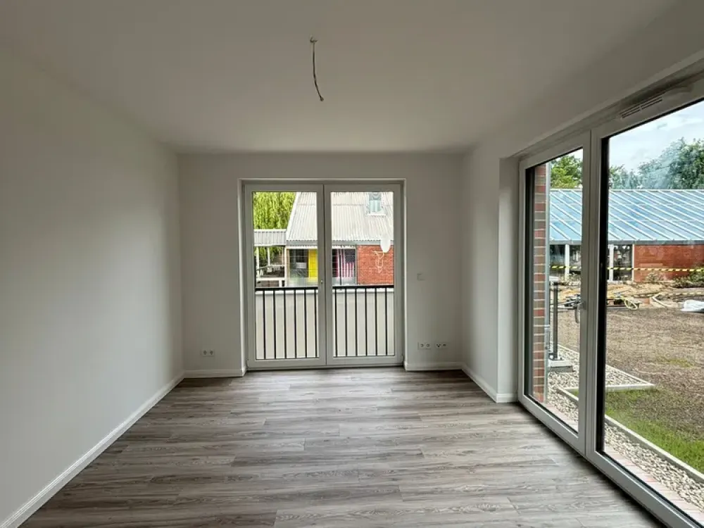 Neubau: Exklusive 3-Zi.-Whg. (ca. 78 m²) mit Loggia + TG-Stellplatz in zentraler Wohnlage