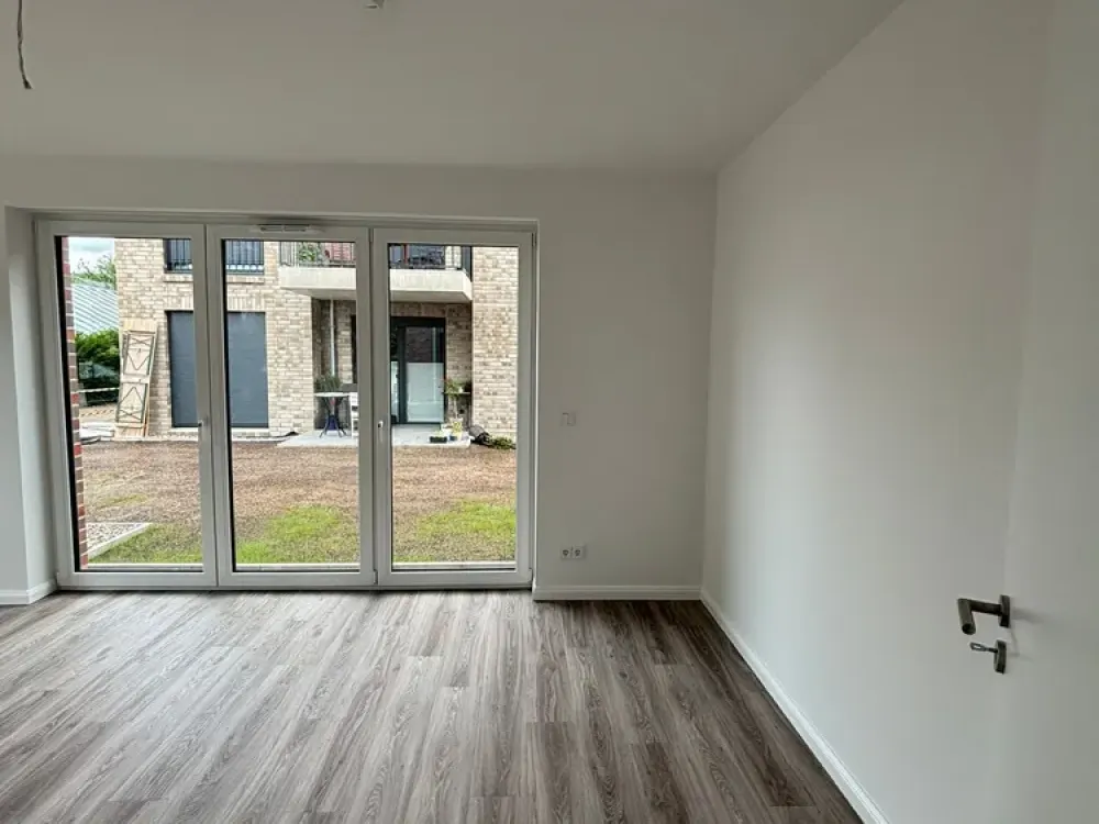 Neubau: Exklusive 3-Zi.-Whg. (ca. 78 m²) mit Loggia + TG-Stellplatz in zentraler Wohnlage
