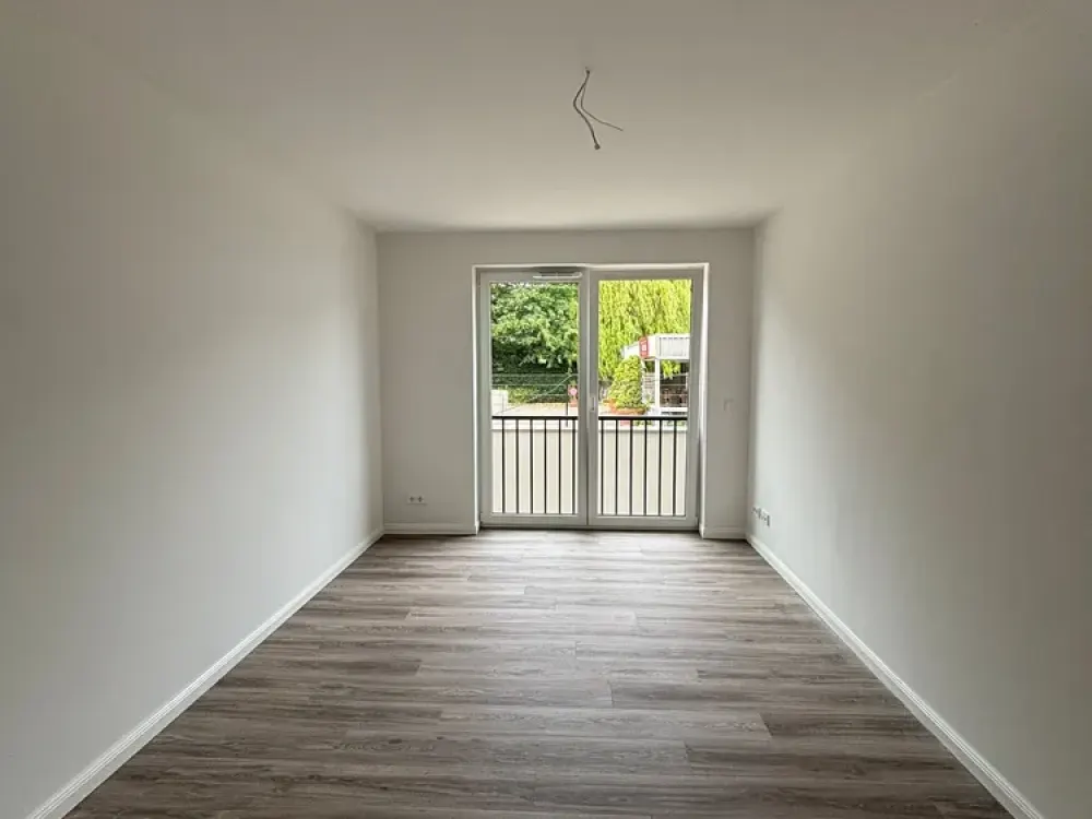Neubau: Exklusive 3-Zi.-Whg. (ca. 78 m²) mit Loggia + TG-Stellplatz in zentraler Wohnlage