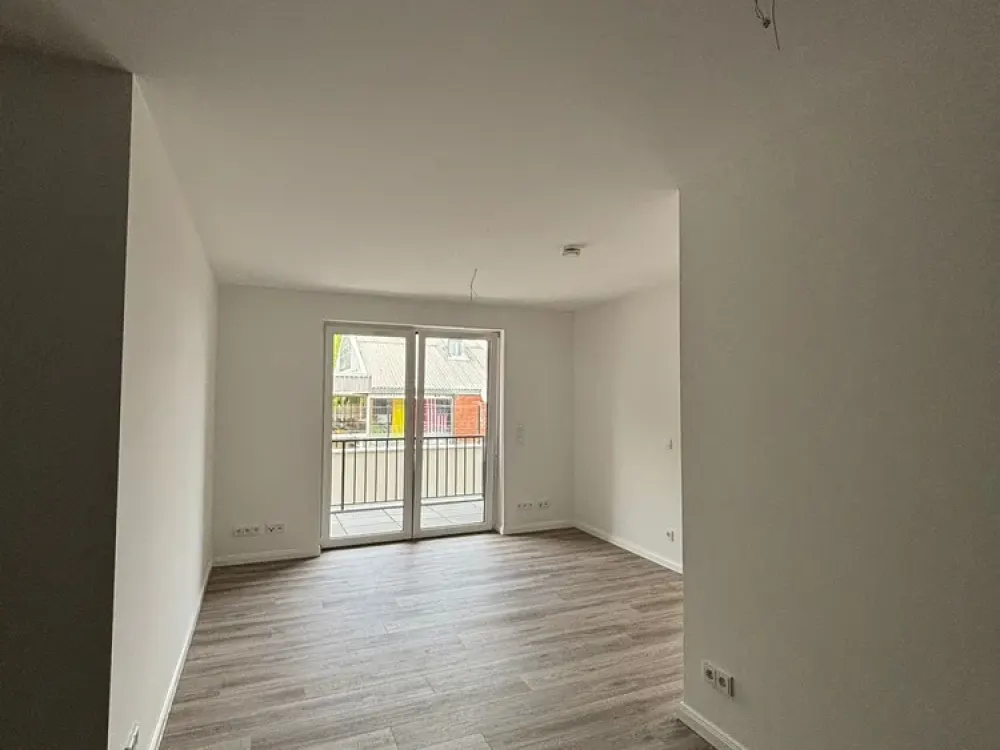 Neubau: Exklusive 3-Zi.-Whg. (ca. 78 m²) mit Loggia + TG-Stellplatz in zentraler Wohnlage