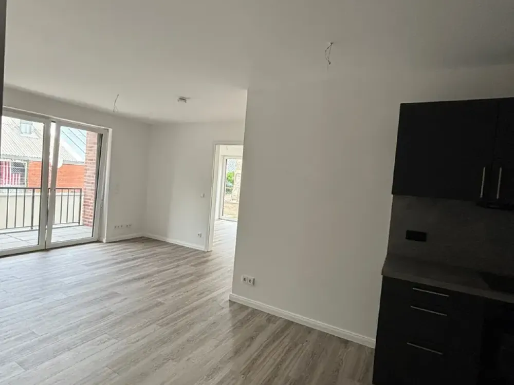 Neubau: Exklusive 3-Zi.-Whg. (ca. 78 m²) mit Loggia + TG-Stellplatz in zentraler Wohnlage