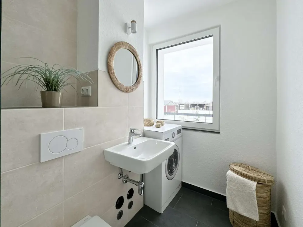 First occupancy after renovation: Modern 2-room apartment with fitted kitchen, balcony and parking space