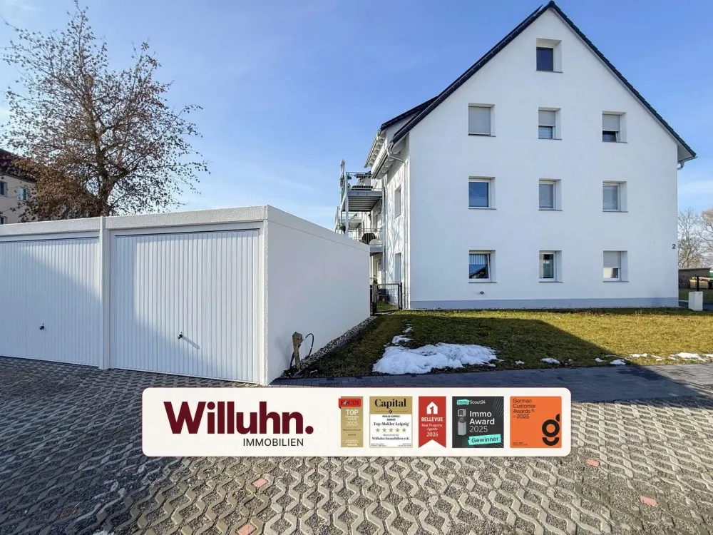 Hochwertige Ausstattung mit Tageslichtbad, Balkon, Stellplatz und Garage