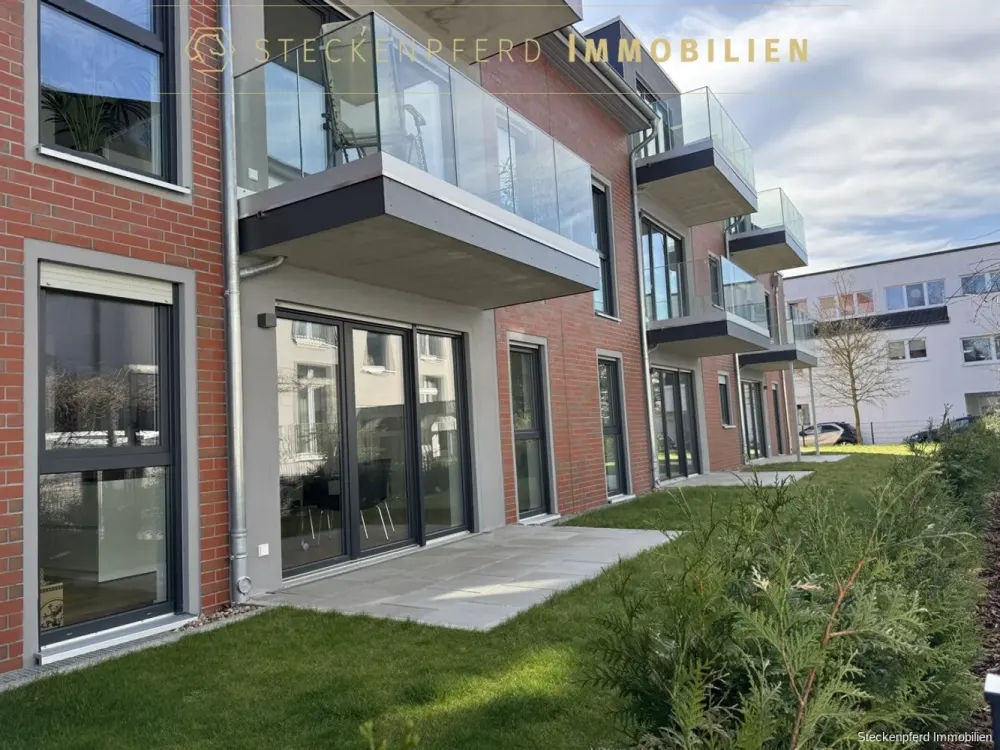 Stilvolle EG-Wohnung mit Garten für anspruchsvolle Mieter mit EBK und Wallbox im schicken Neubau!