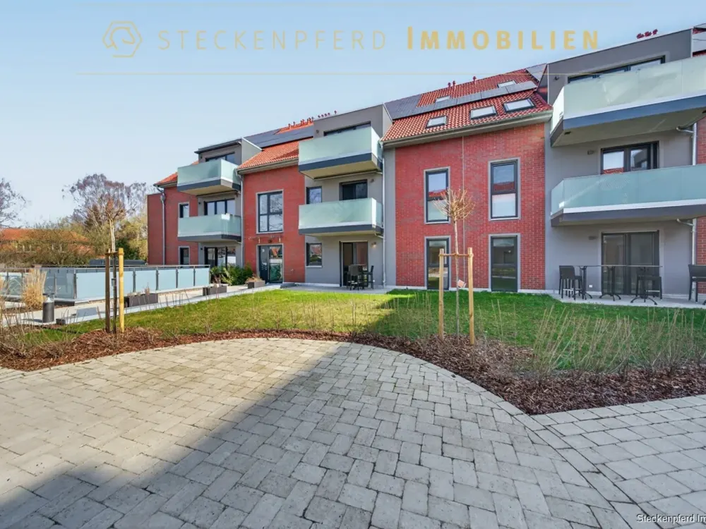 Stilvolle EG-Wohnung mit Garten für anspruchsvolle Mieter mit EBK und Wallbox im schicken Neubau!