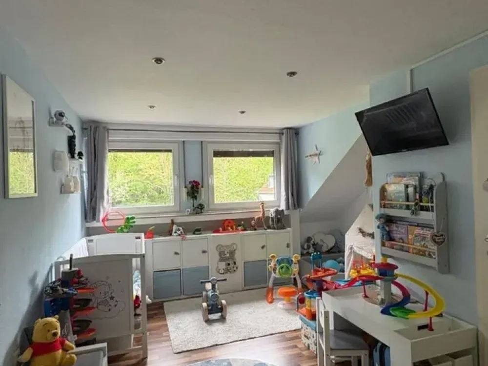 Wohnen mit Charakter: 3,5-Zimmer-Dachgeschosswohnung mit eigenen Garten in Dortmund-Neuasseln