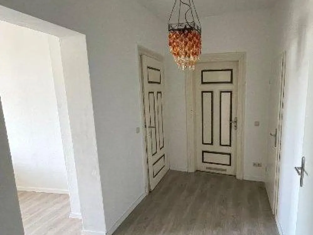 غرفة في سكن مشترك مع مطبخ مدمج، غسالة ملابس ومجفف