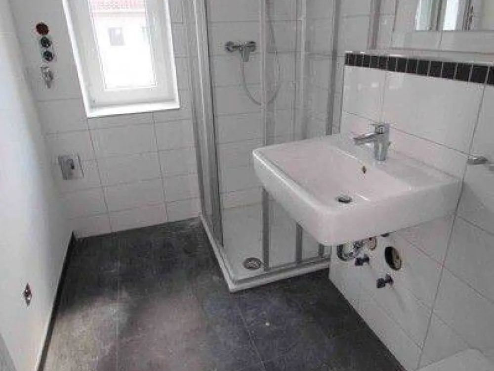 Central living with a view - 2 rooms - with balcony and fitted kitchen