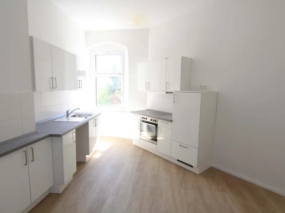 Atmosphärischer Altbauklassiker mit Dielen und EBK - tolle Lage Radickestraße!