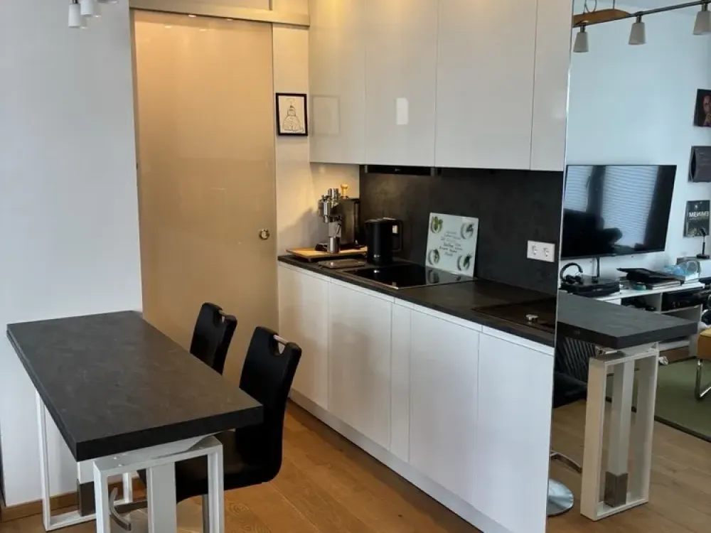 Moderne, vollmöblierte 1,5-Zimmer-Wohnung mit Terrasse im „Living Isar“
