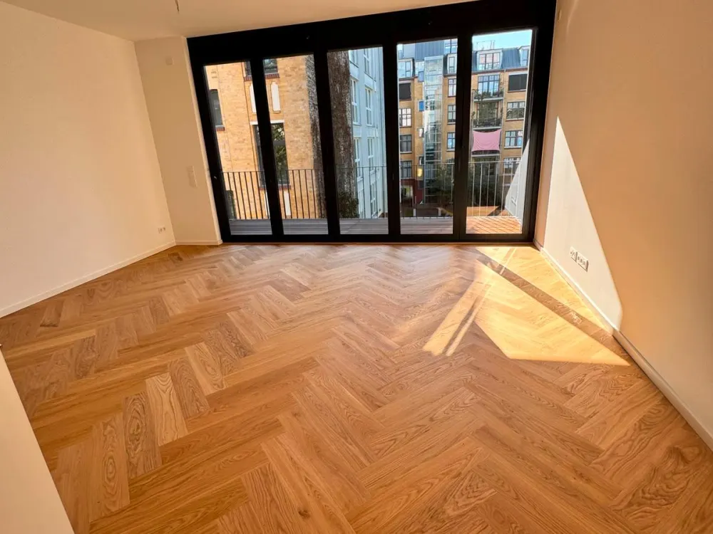 Heart of Friedrichshain: 2/3-room newly built loft with balcony