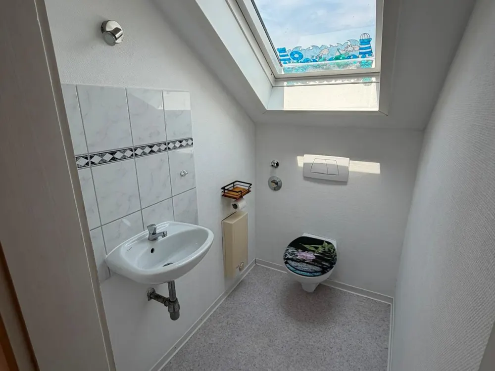 Helle 3 Zimmer DG Wohnung in zentraler Lage