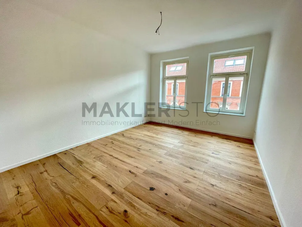 **Lichtdurchfluteter Erstbezug - 2 Zimmer mit Tageslichtbad, offener Wohnküche & Balkon**