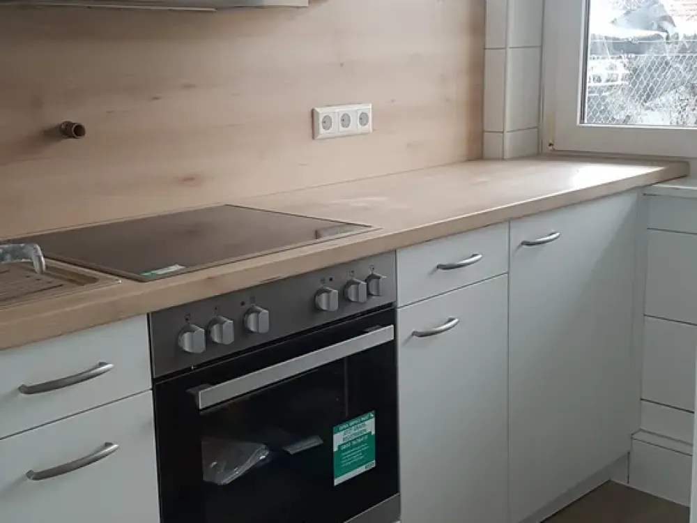 Einzimmerwohnung mit Gartennutzung und überdachtem Außenbereich