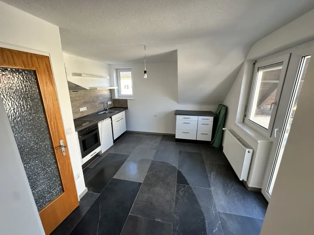 Erstbezug nach Kernsanierung: Moderne 3-Zimmer-Wohnung mit Balkon, Garten & Stellplatz