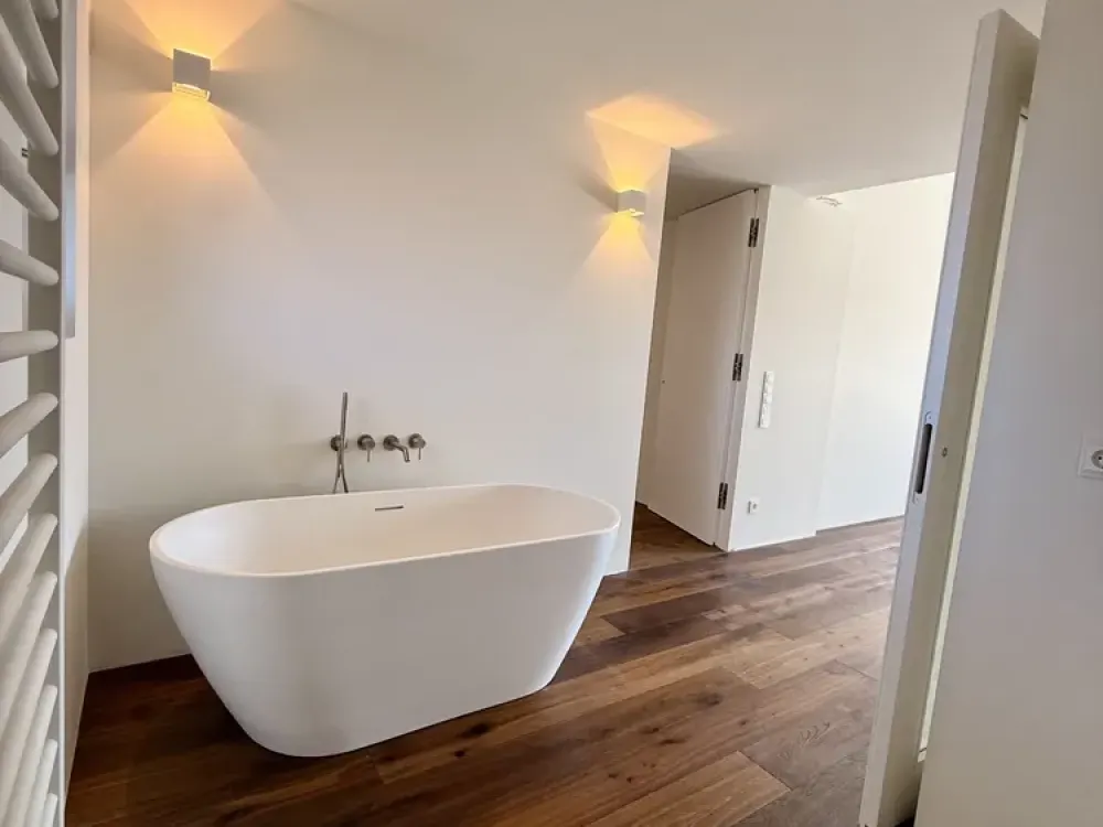 Erstbezug: Zentral & stilvoll wohnen mit Weitblick, 2 Dachterrassen