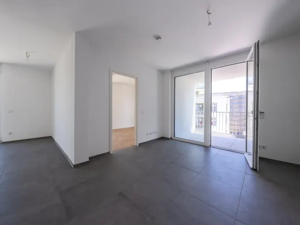 Stilvoll wohnen im sanften Morgenlicht: Moderne 2 Zi. Wohnung mit Ost- Balkon