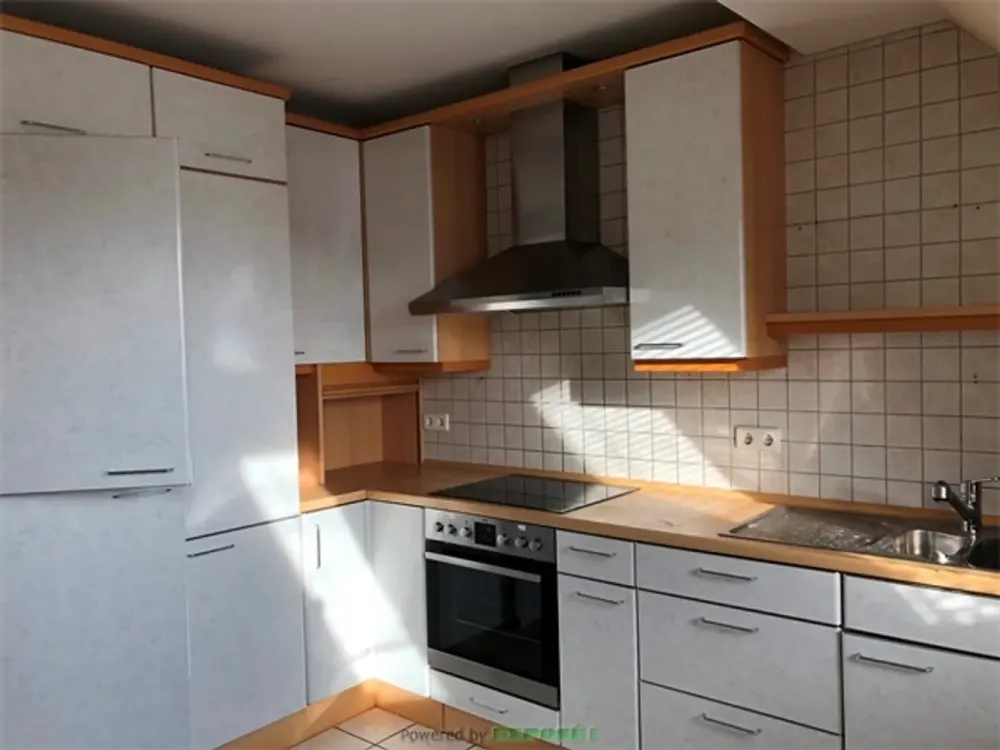 Dachgeschosswohnung mit loftartigem Wohnraum und Büro