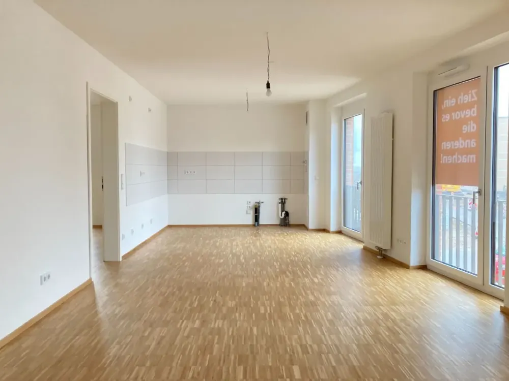 KRONSRODE | Neuwertige 2-Zimmer-Wohnung mit Parkettboden und TG-Stellplatz (optional)