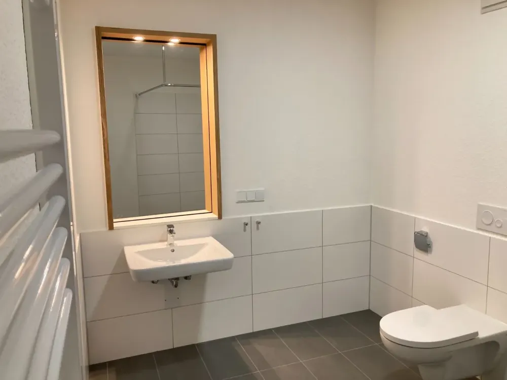 KRONSRODE | Neuwertige 2-Zimmer-Wohnung mit Parkettboden und TG-Stellplatz (optional)