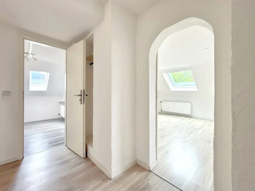 Above the Roofs of Blumenplatz, Modernized 2-Room Apartment with Built-in Kitchen