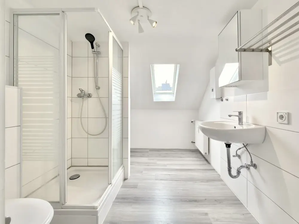Above the Roofs of Blumenplatz, Modernized 2-Room Apartment with Built-in Kitchen