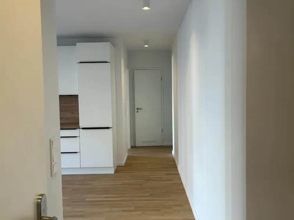 Provisionsfreier Erstbezug: barrierefreie 2-Zimmer-Wohnung mit Terrasse und 90 m² Garten