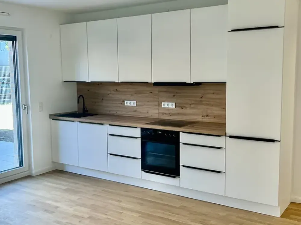Provisionsfreier Erstbezug: barrierefreie 2-Zimmer-Wohnung mit Terrasse und 90 m² Garten