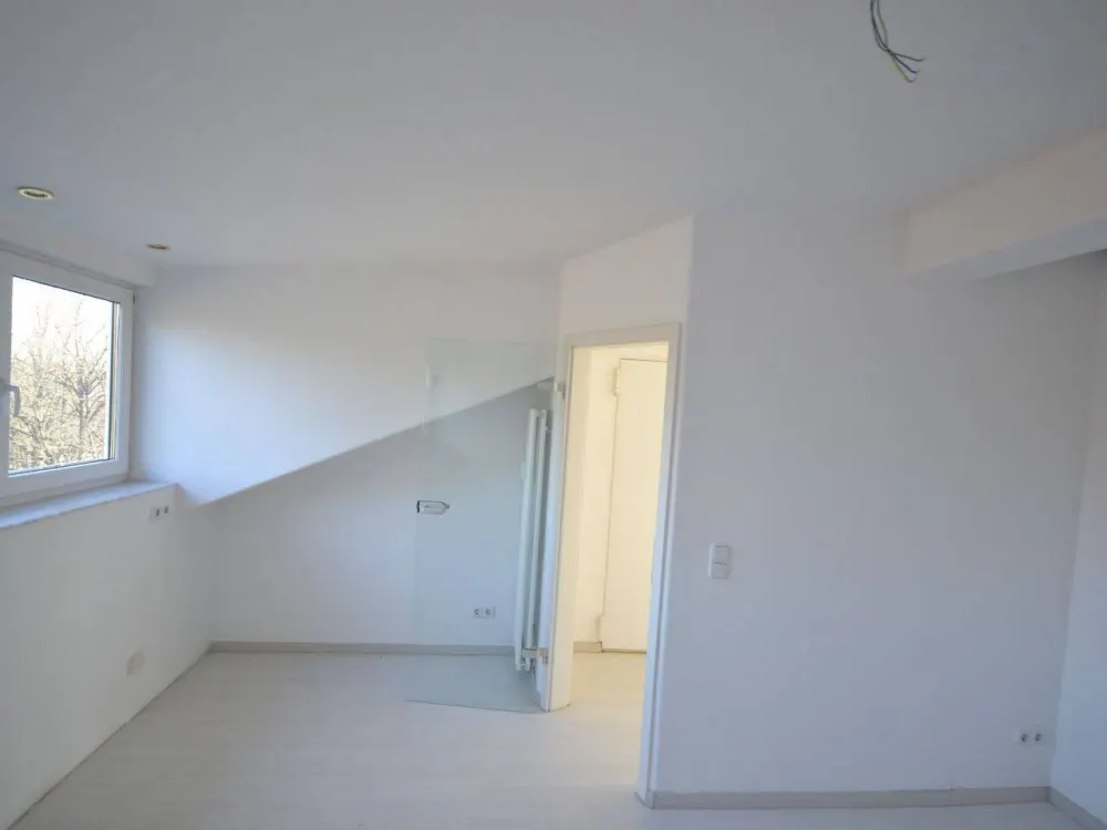 Charmante 2-Zimmer-Wohnung über den Dächern Münchens