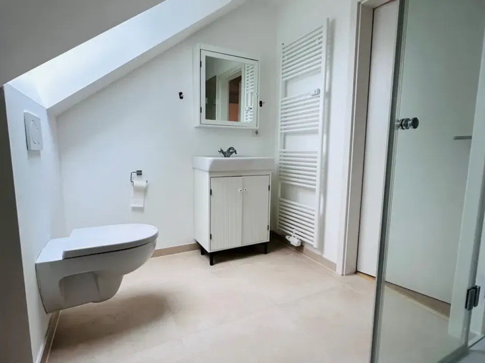 Moderne 2-Zimmer-Dachgeschosswohnung mit herrlichem Feldblick