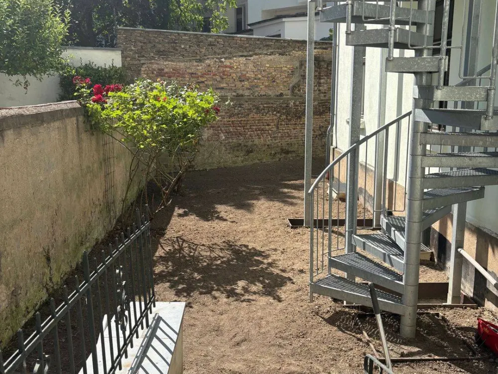 Completely Renovated and Partially Furnished Garden Apartment in Pempelfort