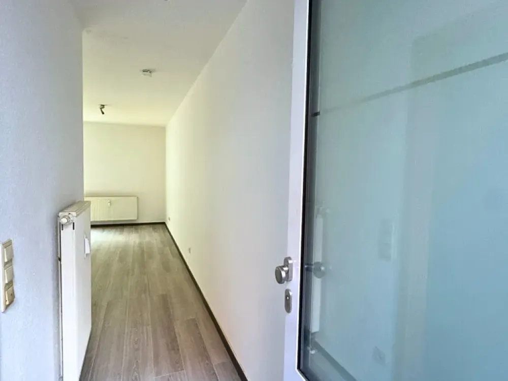 Renovierte 1-ZKB-Wohnung mit Stellplatz + Kellerraum