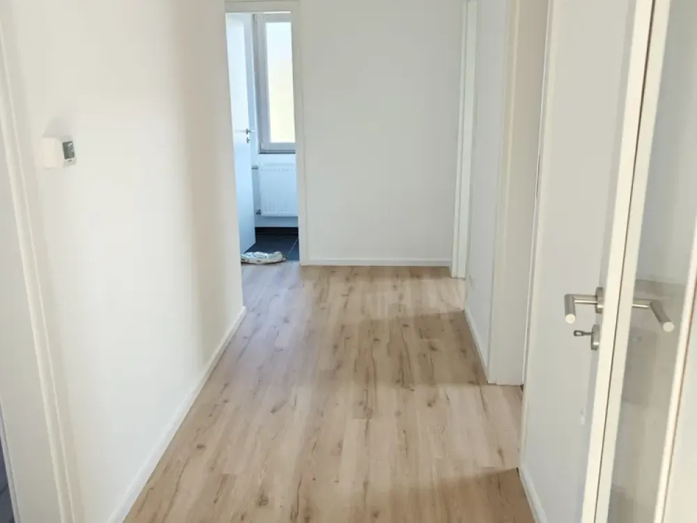 Freshly Renovated 3-Room Attic Apartment in Green Surroundings, Underfloor Heating, Heat Pump & Forest View