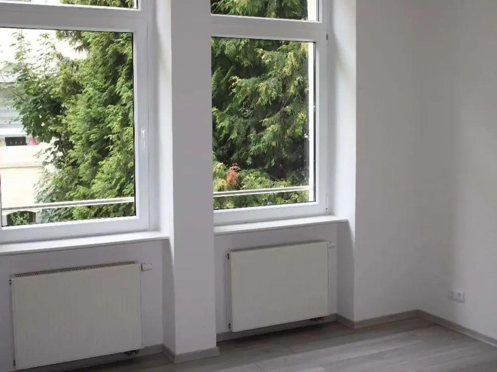 Nicht weit zur UNI ! Gepflegte 3 Zimmer mit EBK, Balkon und Gartennutzung in ruhiger Stadtrandlage