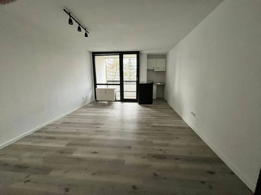 1-Zimmer-Wohnung mit Balkon, Tiefgarage & Aufzug in zentraler Lage