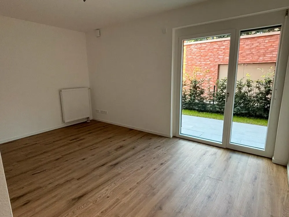 Gehobene 4-Zimmer-Wohnung mit Gartenanteil, Balkon,Gäste-WC u.v.m