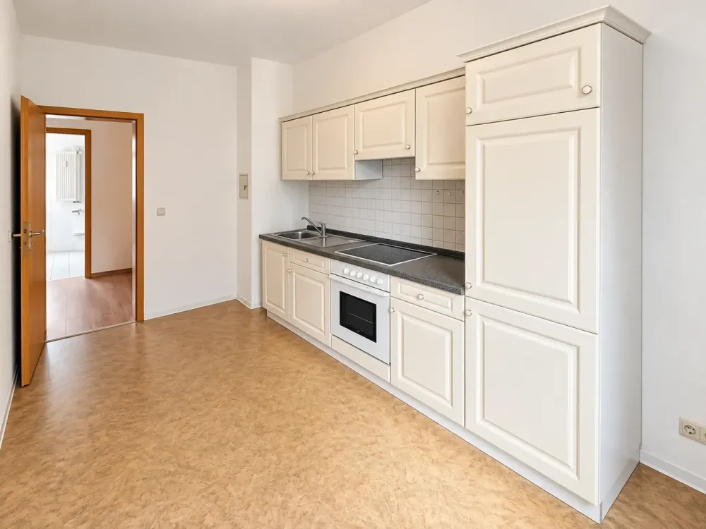 Freundliche 2-RW mit schönem Süd-Balkon* EBK* 1.OG* Tageslichtbad mit Wanne* Garten* zentrale Lage*