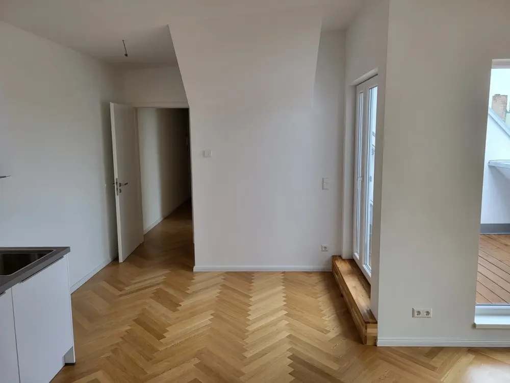 Dachgeschoßneubau mit 2-Zimmer, EBK und Parkett
