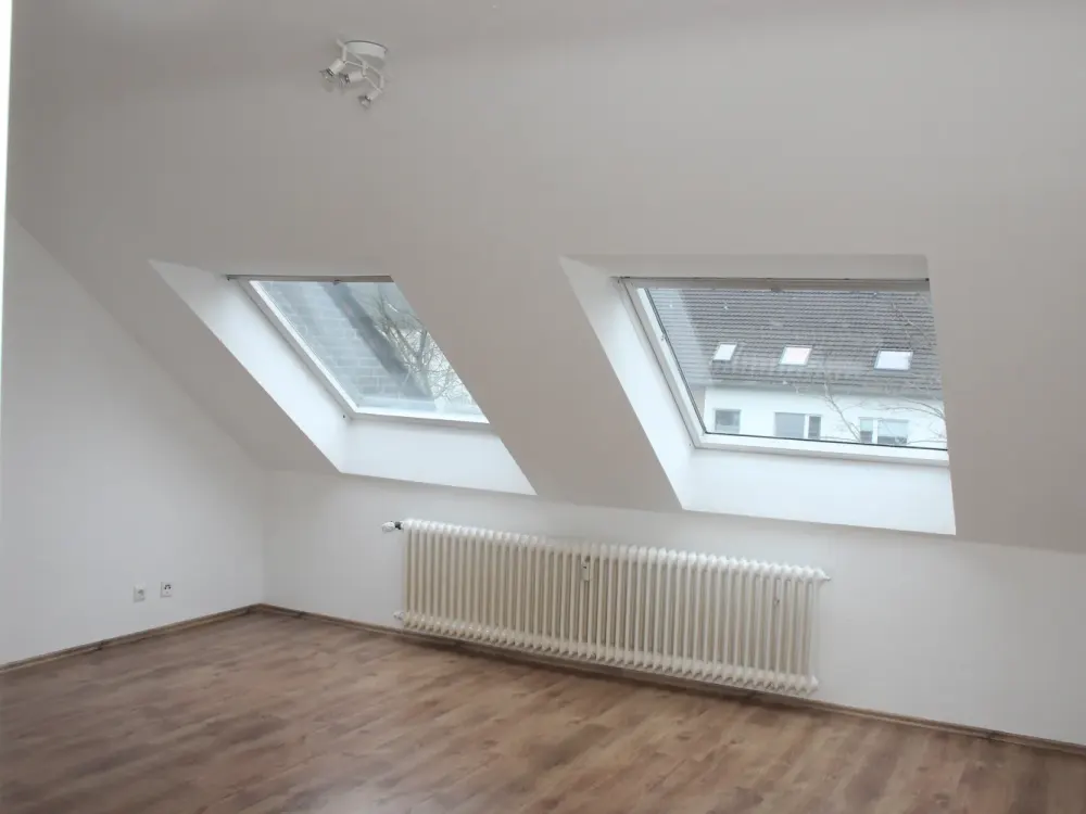 Stilvolle, gepflegte 2-Zimmer-Dachgeschosswohnung mit Einbauküche in Meerbusch