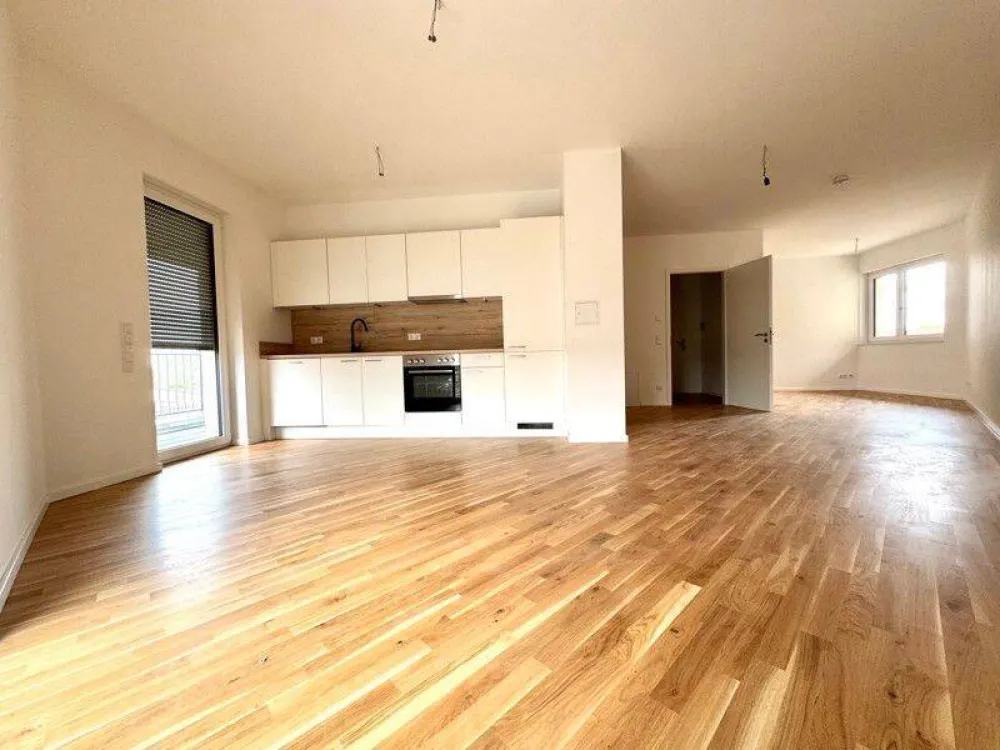 Perfekt für uns: ansprechende 4-Zimmer-Wohnung mit Einbauküche im Erstbezug