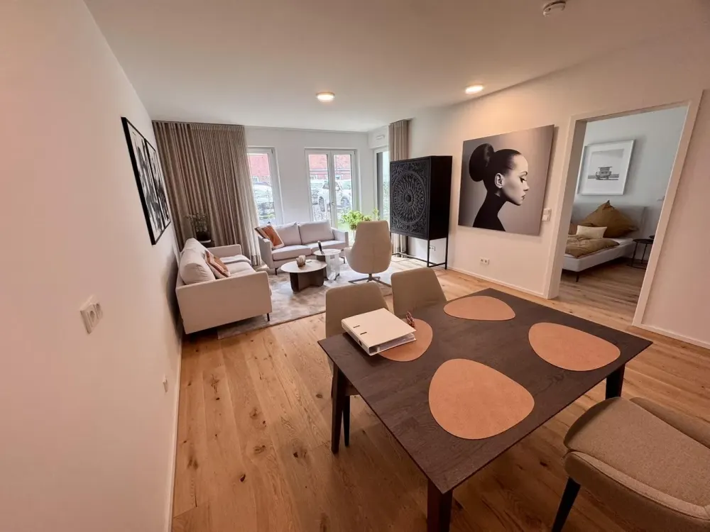 Möbelierte Neubau 2-Zimmer Wohnung mit sonniger Terrasse und Garten