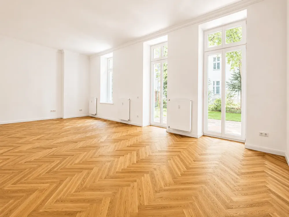 Seltene 4-Zimmer-Gartenwohnung mit ca. 173 m² Privatgarten, direkt am Adenauerplatz!