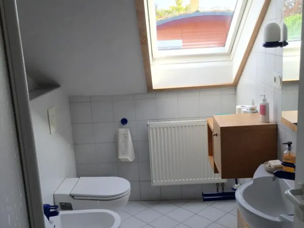 Practical 3.5-Room Attic Apartment in Karlsdorf-Neuthard