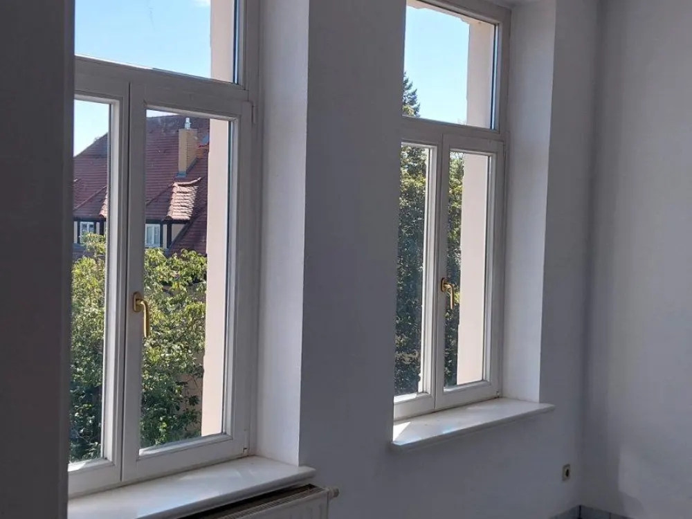 Beeindruckende 2-Zi Whg. mit Stuck / Parkett in freist. Villa