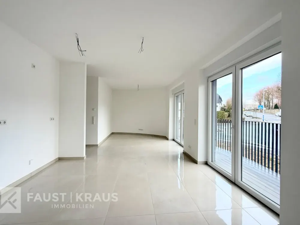 Erstbezug - Wohnkomfort in energieeffizientem Neubau mit eigenem Gartenanteil und Einbauküche