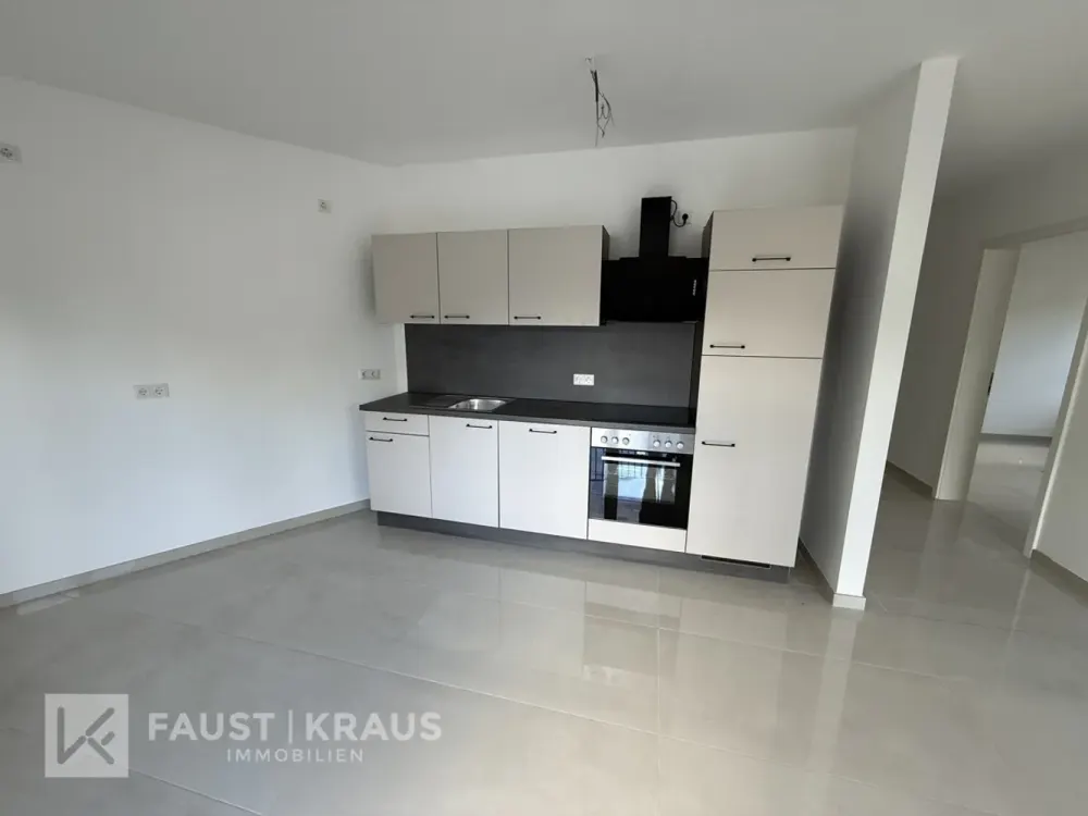 Erstbezug - Wohnkomfort in energieeffizientem Neubau mit eigenem Gartenanteil und Einbauküche