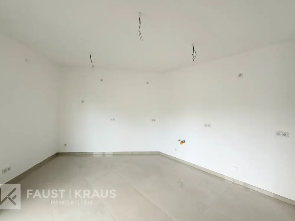 Erstbezug - Wohnkomfort in energieeffizientem Neubau mit eigenem Gartenanteil und Einbauküche