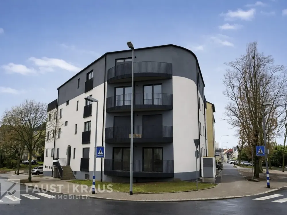 Erstbezug - Wohnkomfort in energieeffizientem Neubau mit eigenem Gartenanteil und Einbauküche