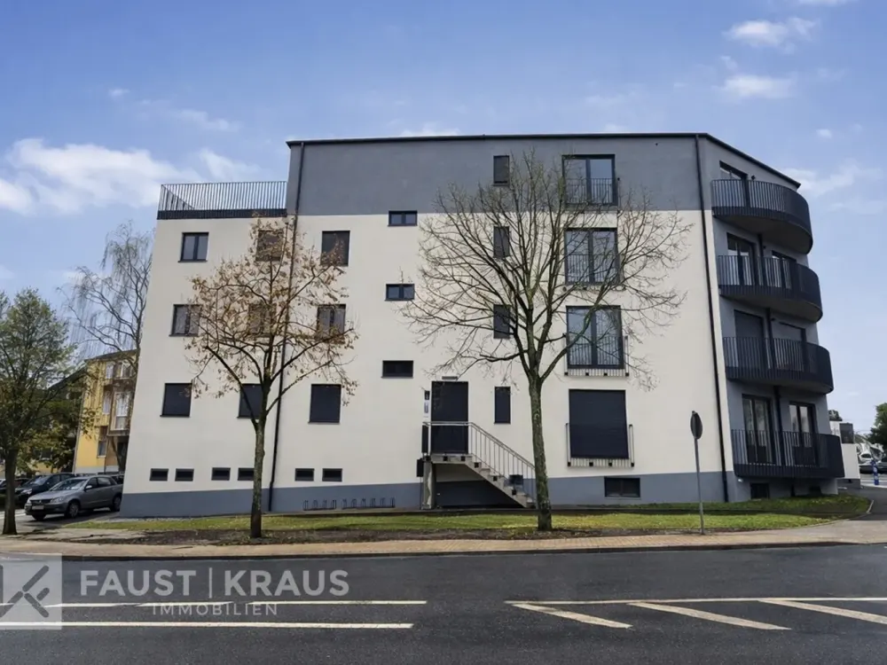 Erstbezug - Wohnkomfort in energieeffizientem Neubau mit eigenem Gartenanteil und Einbauküche